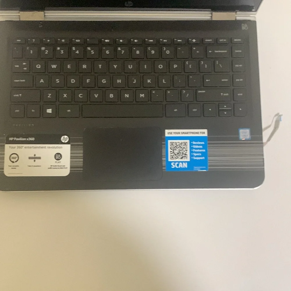 A broken HP Pavilion x360 laptop